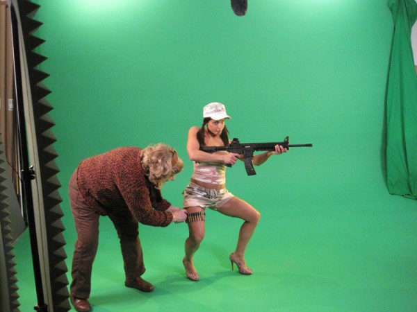 wardrobe artist and talent on green screen studio set