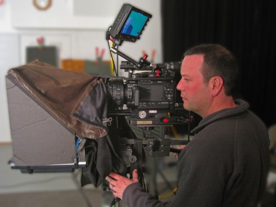 st lous video production camera operator with teleprompter attached