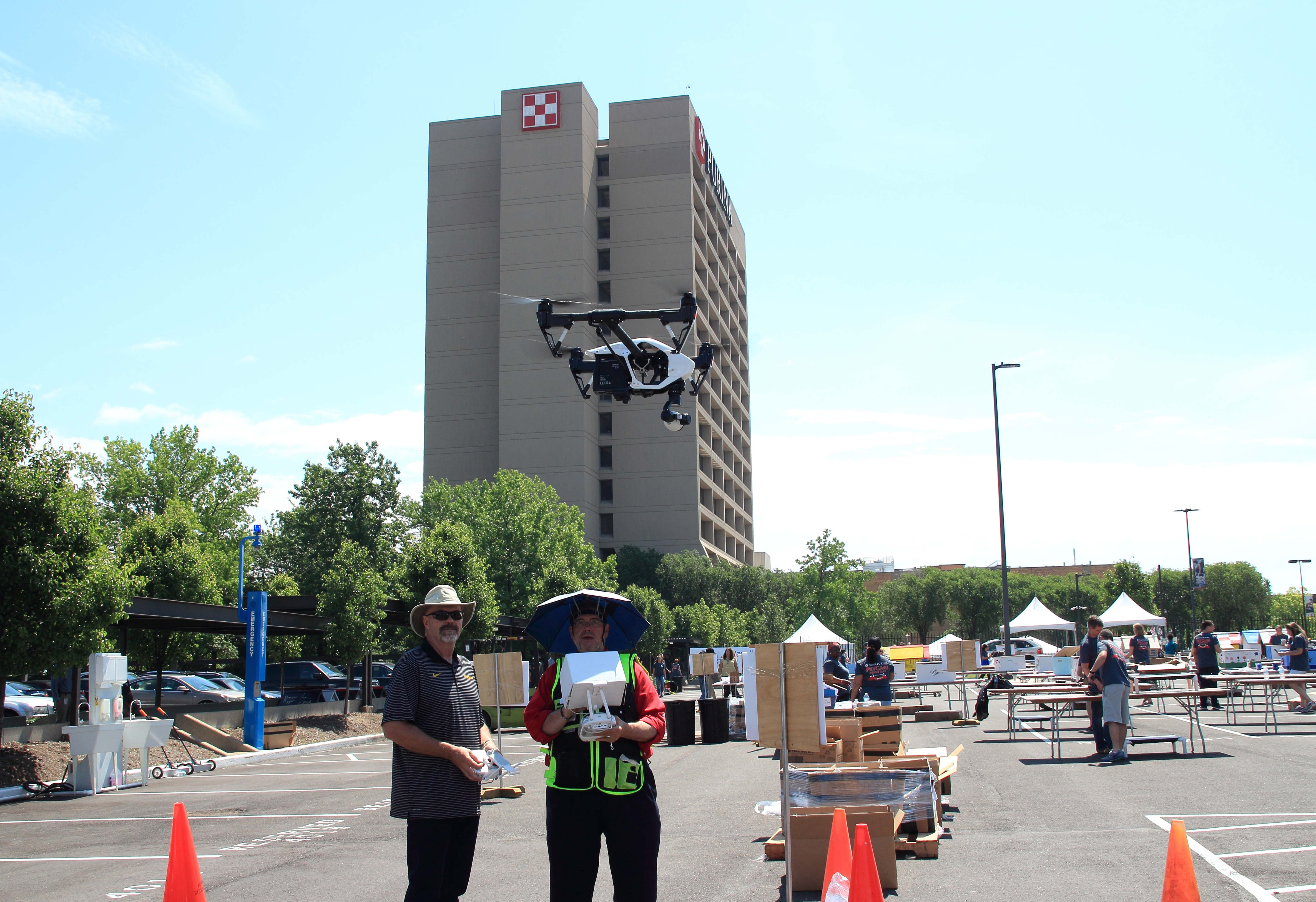 Two person drone crew for suggested FAA safety.