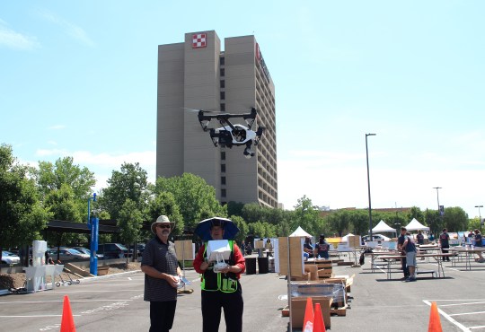 Two person drone crew for suggested FAA safety.
