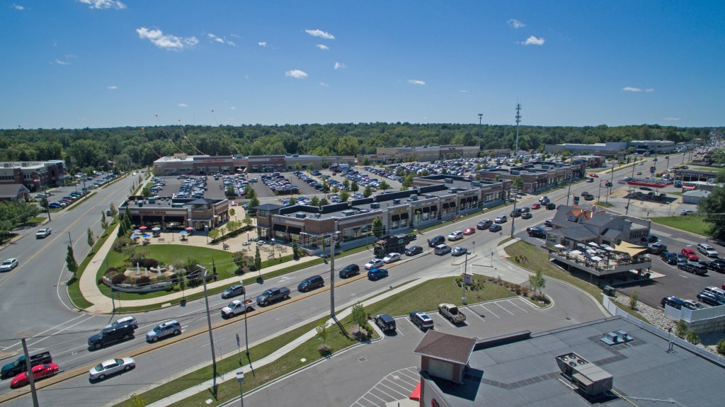 Drone shot stock footage busy street